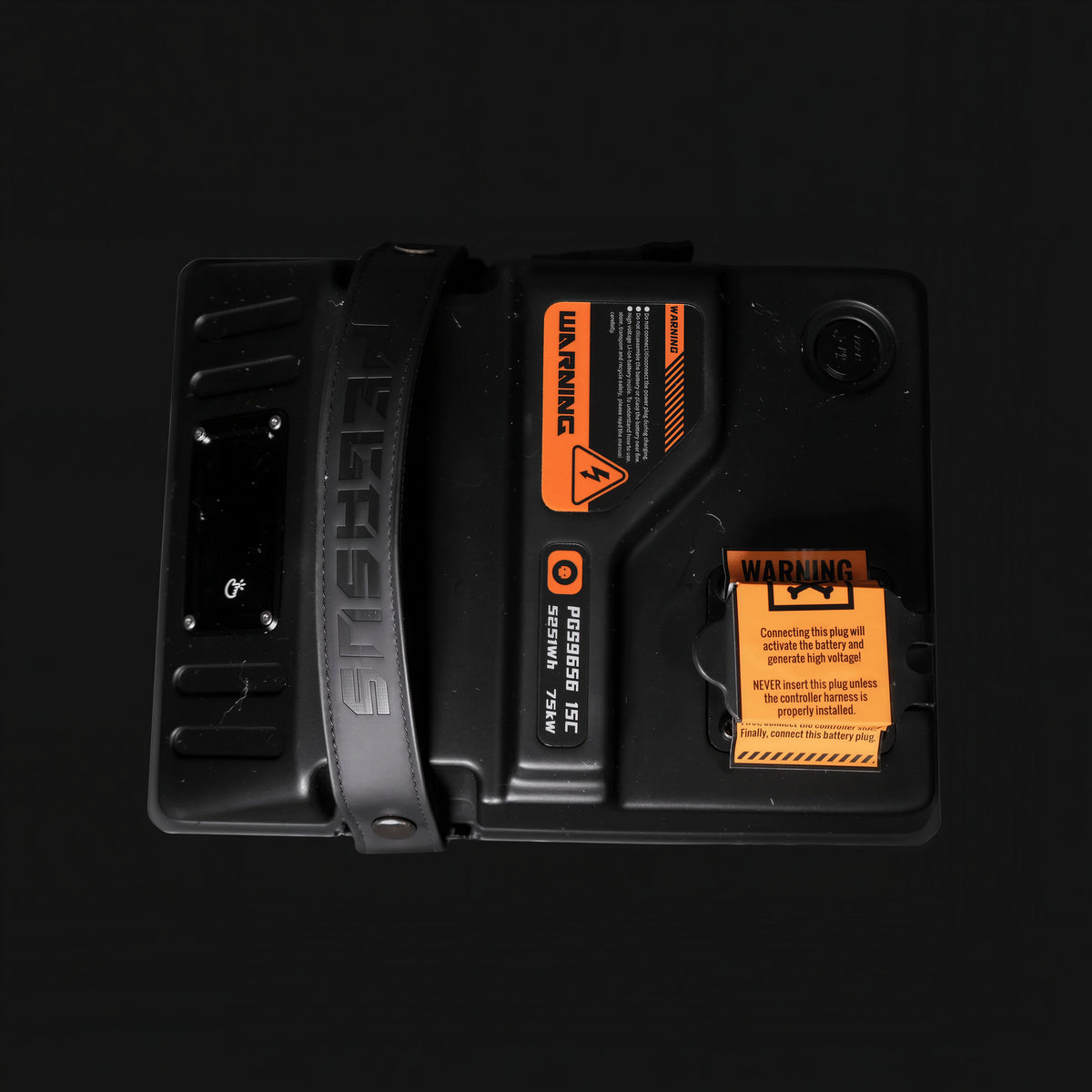 Top view of the VTB Pegasus battery with carry strap, charge port and high-voltage warning labels